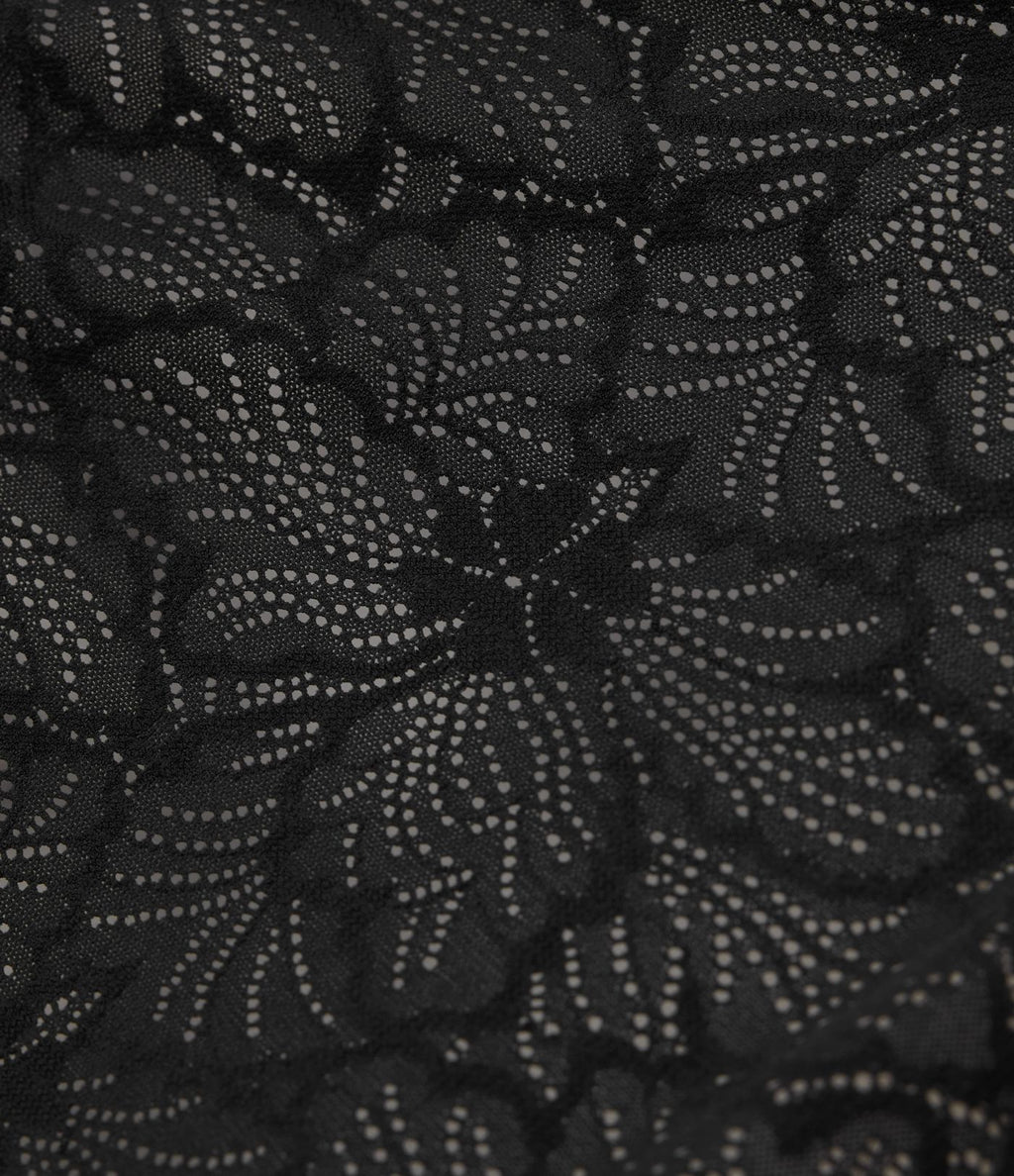 Haut asymétrique à une épaule avec dentelle, manches courtes, ourlet arrondi et coussinets amovibles