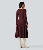 Robe mi-longue évasée maille côtelée à décolleté en V et manches longues