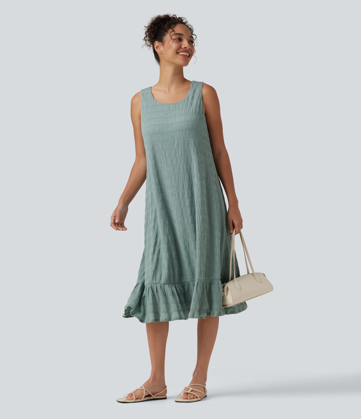 Robe midi sans manches à encolure arrondie avec coussinets amovibles et ourlet à volants