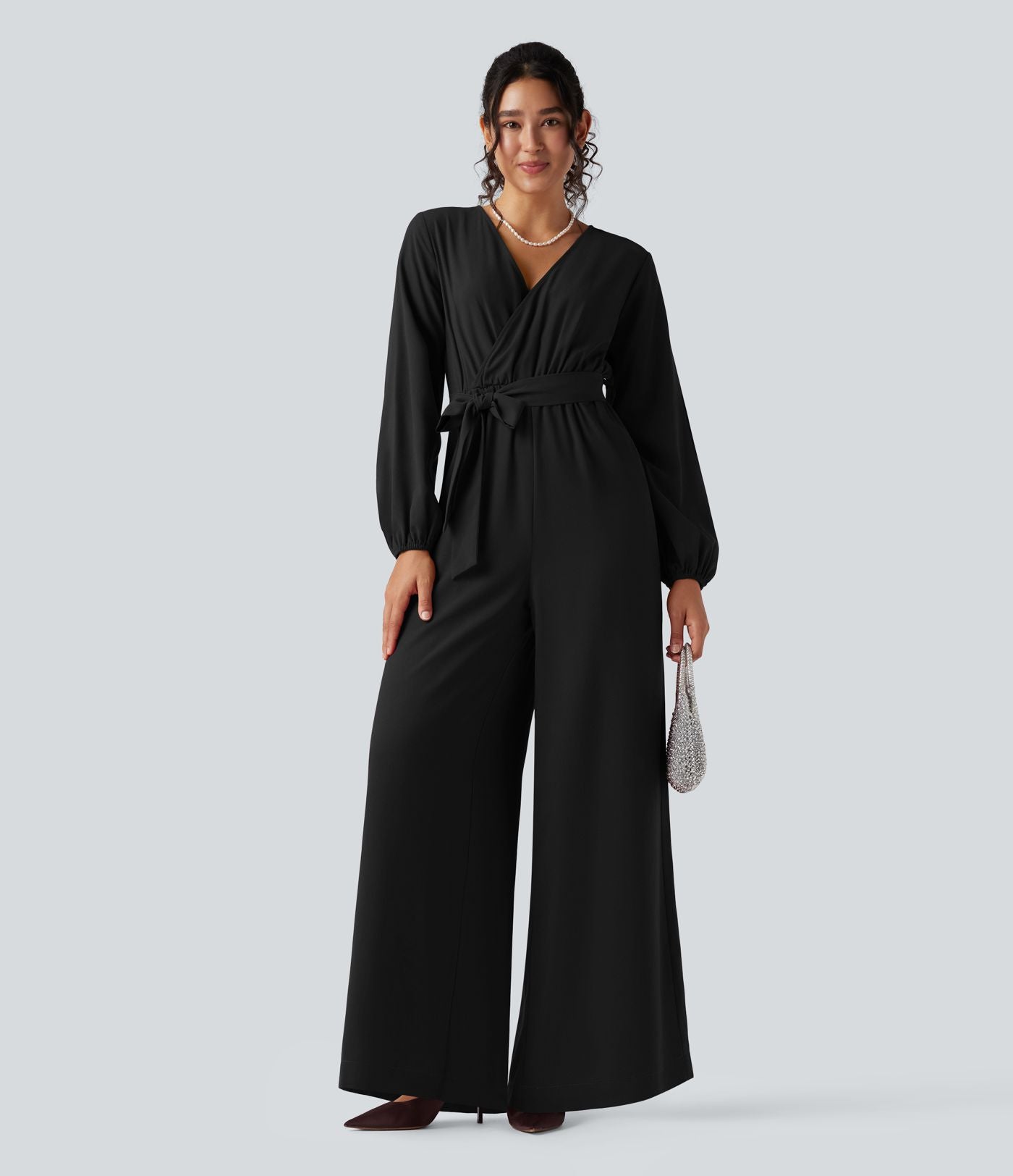 Combinaison pantalon de soirée large à décolleté en V, manches longues bouffantes, ceinture et poches