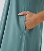 Robe décontractée mi-longue Breezeful™ dos nageur poche latérale fluide asymétrique séchage rapide A-C