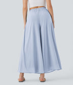 Pantalon fluide et ample avec superposition en mesh, poches latérales et taille haute