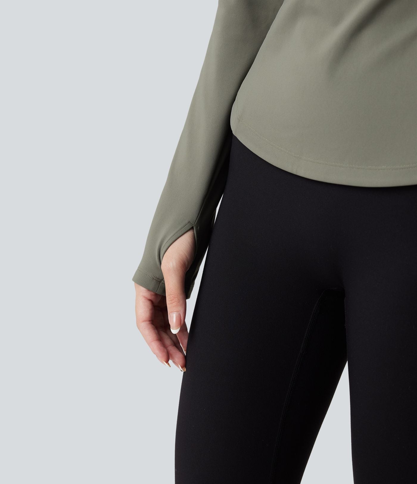 Haut de sport yoga polaire col montant demi-zip à manches longues avec passants pouces