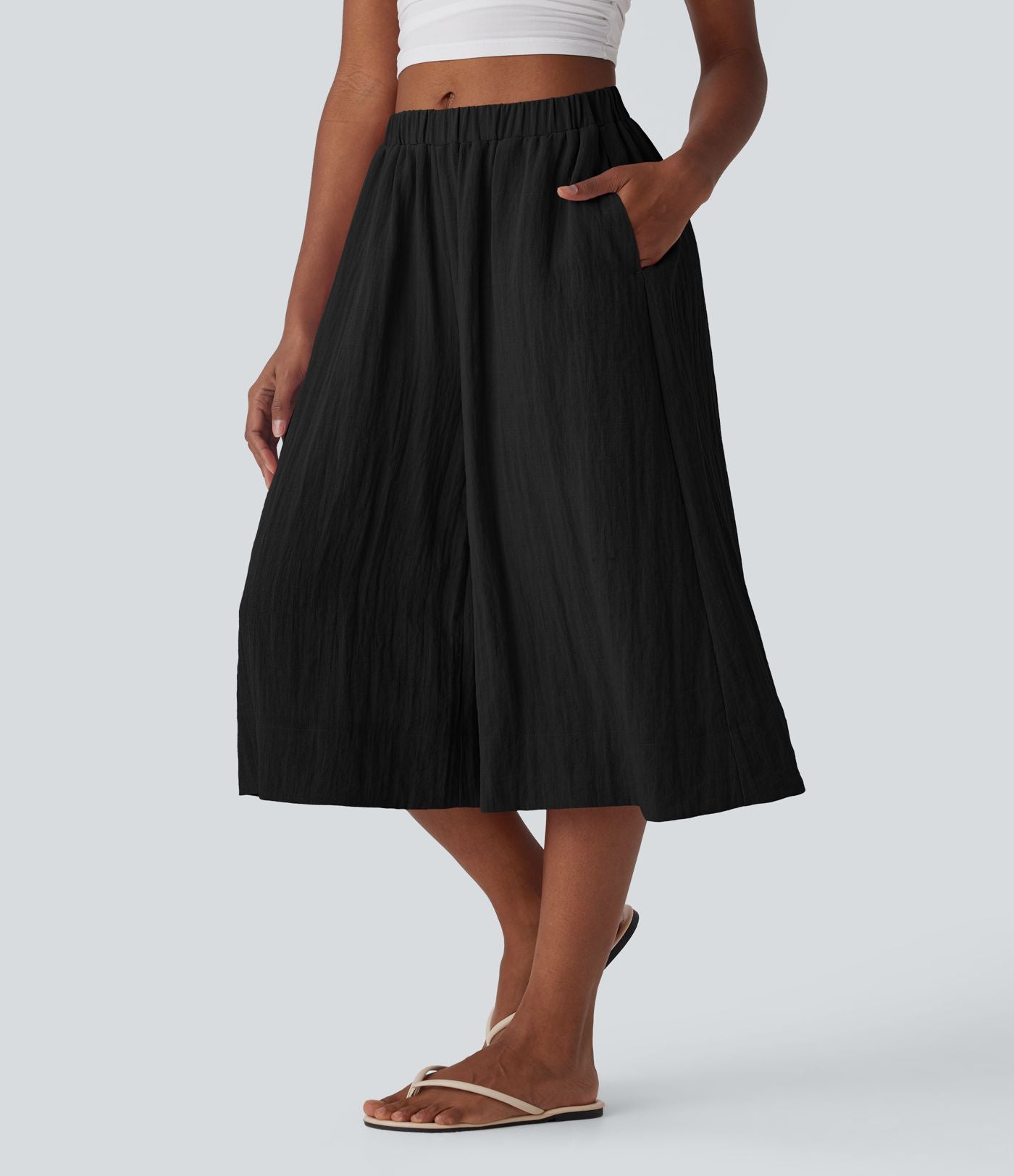 Pantalon fluide large taille mi-haute effet lin avec poche