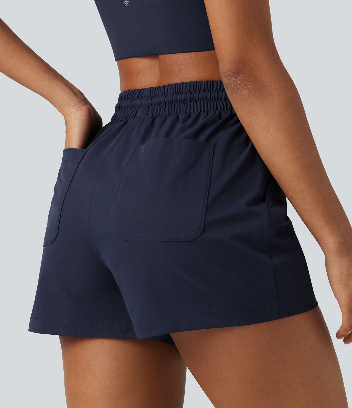 Short de sport baggy taille haute extensible en popeline avec cordon de serrage et poches
