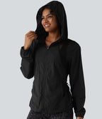 Veste de sport à capuche avec mesh contrasté, cordon de serrage et poches