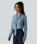 Blouse esprit bureau défroissage facile, col V, manches longues et lien à nouer
