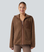 Veste de sport sherpa à manches longues avec ourlet asymétrique arrondi et poches