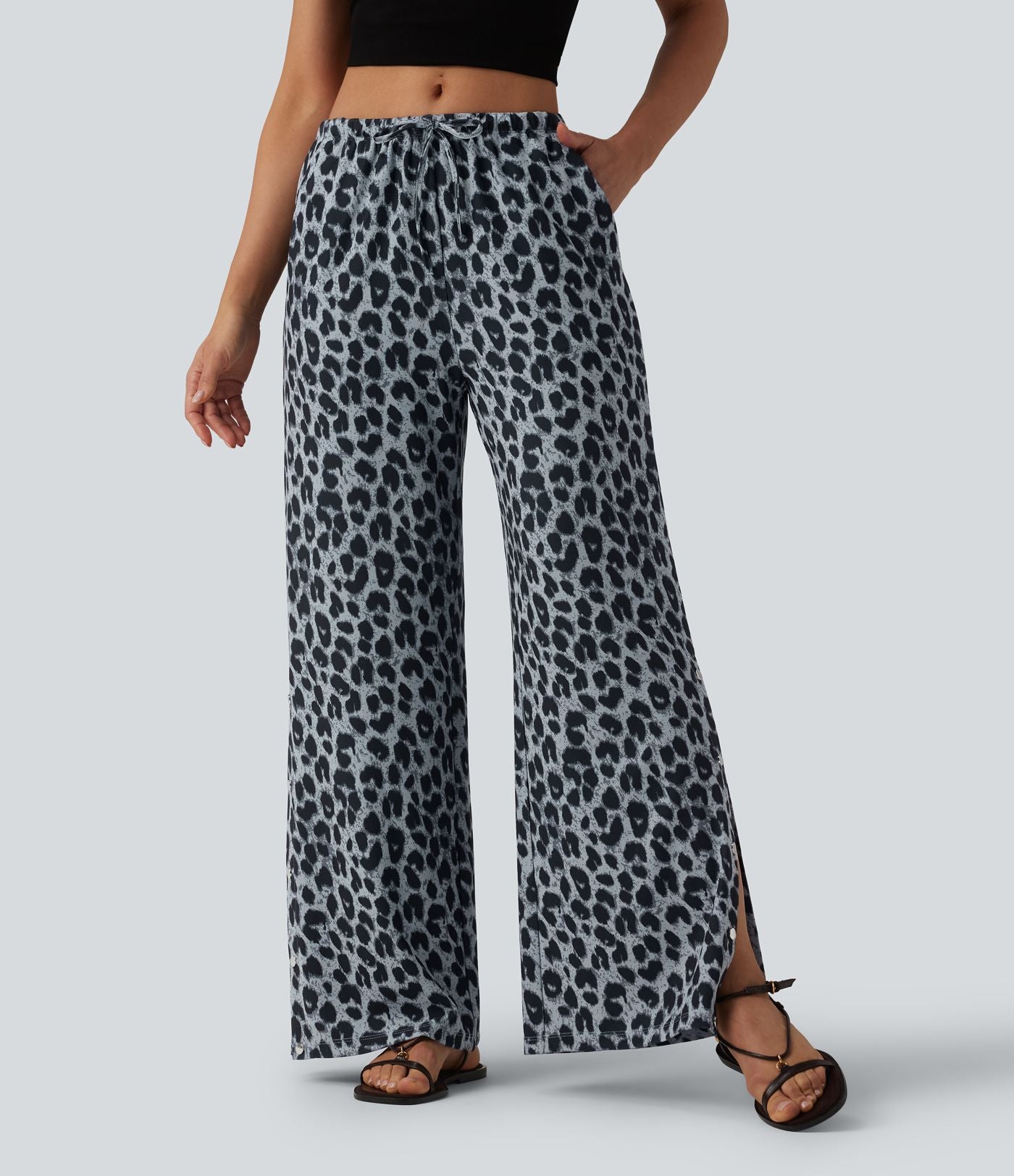 Pantalon large casual en maille gaufrée imprimé léopard taille mi-haute avec cordon de serrage et poches