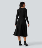 Robe mi-longue évasée maille côtelée à décolleté en V et manches longues