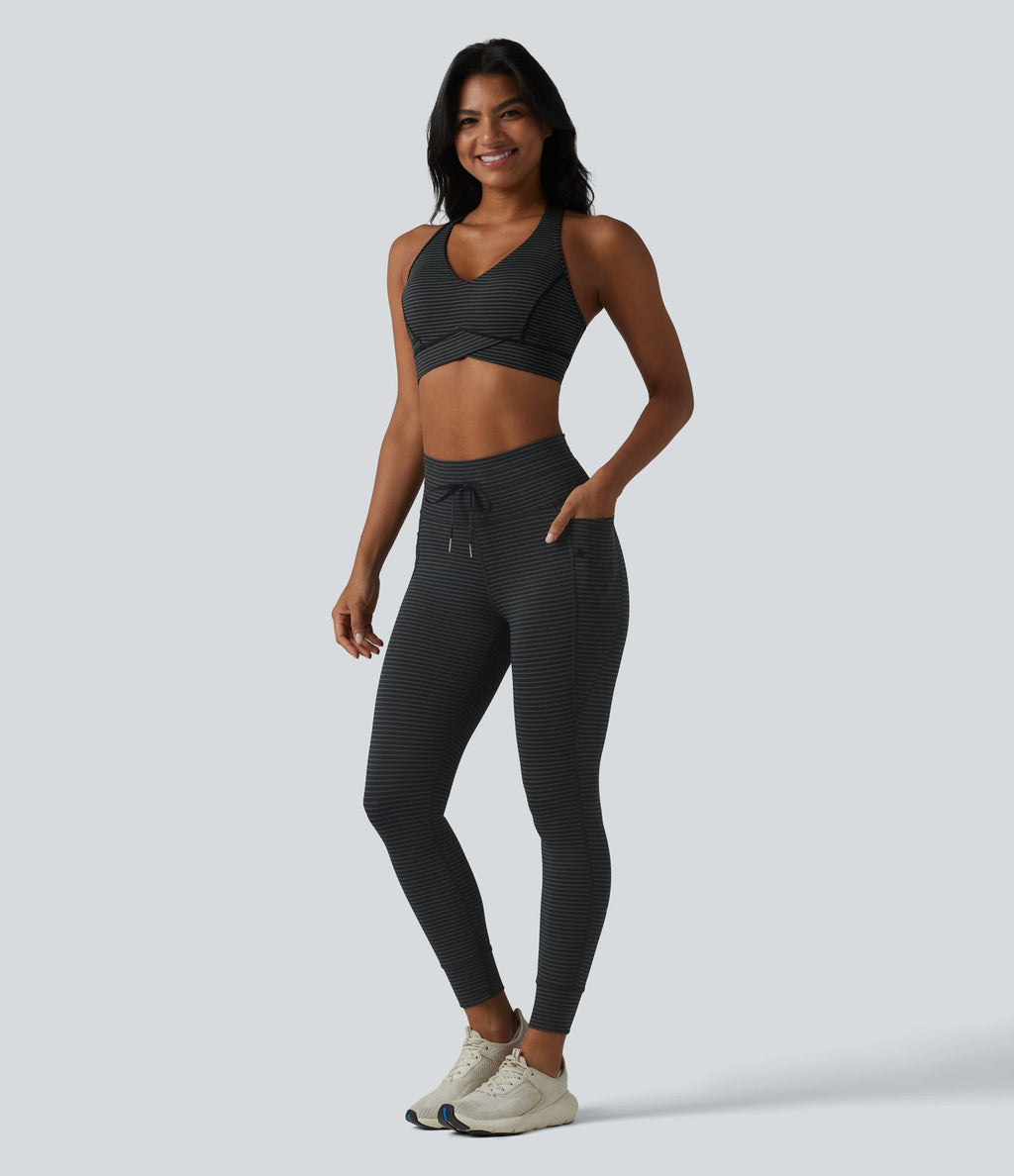 Brassière de sport col V dos nageur maintien moyen à rayures