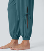 Combinaison de yoga col bateau sans manches dos nu avec découpes et poches latérales à cordon de serrage effet frais InstantCool, protection solaire UPF50+