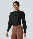 Pull col montant manches bouffantes longues