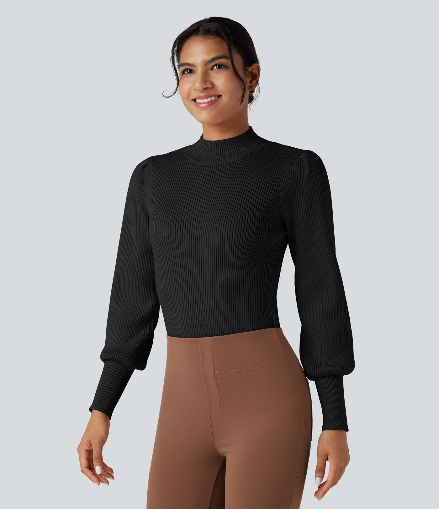 Pull col montant manches bouffantes longues