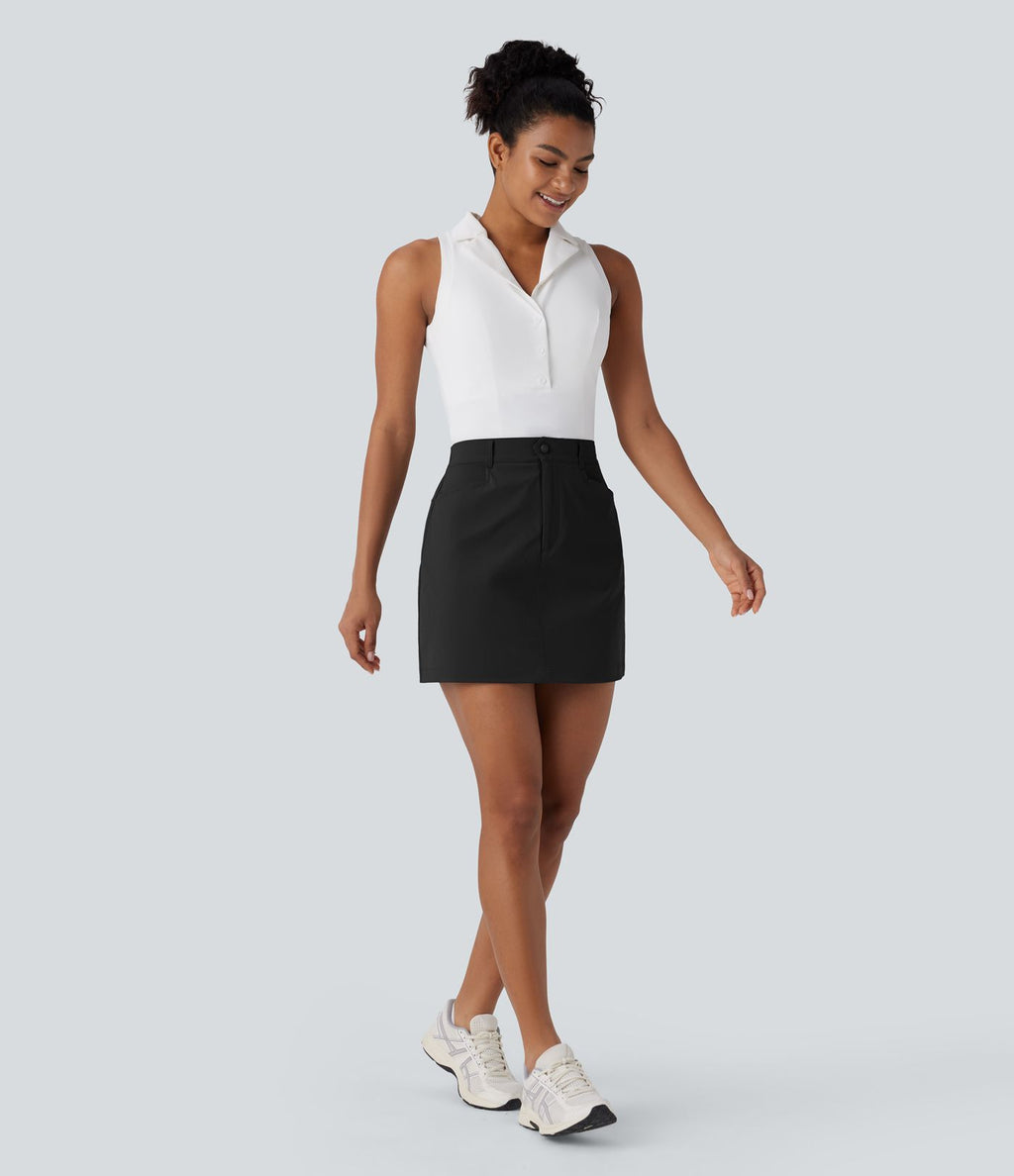 Jupe courte de golf ligne A taille haute avec boutons, zip, poches latérales et fente