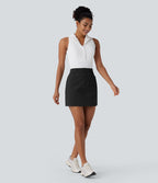 Jupe courte de golf ligne A taille haute avec boutons, zip, poches latérales et fente