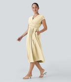 Robe midi Breezeful™ col V manches courtes à liens dans le dos séchage rapide avec poches latérales