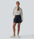 Short tailleur ample à rayures plissées taille haute avec poches