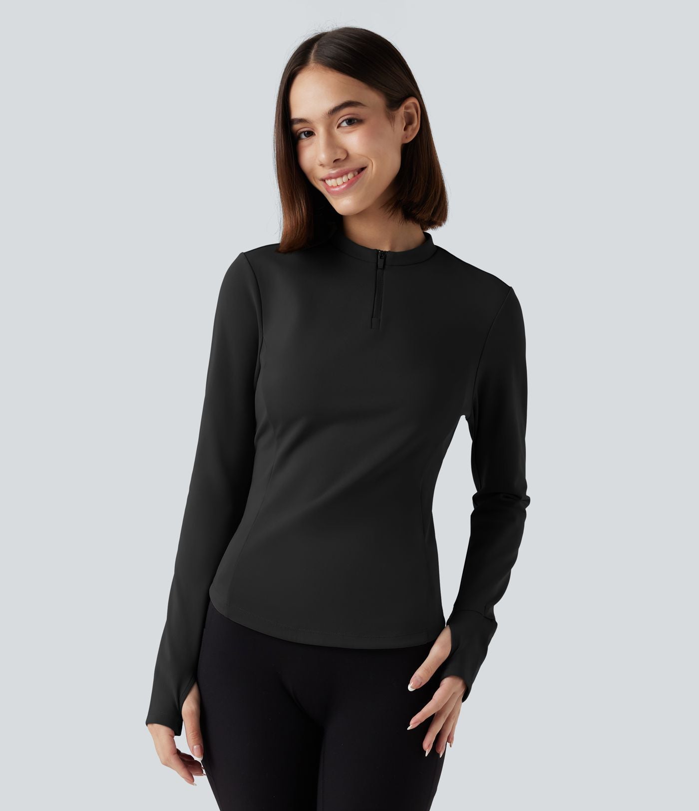 Haut de sport yoga polaire col montant demi-zip à manches longues avec passants pouces