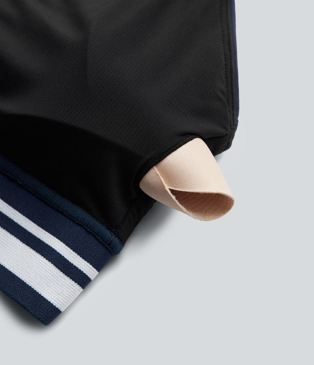 Brassière de sport SoftlyZero™ Plush à maintien léger, dos croisé ouvert, rayures color block et soutien intégré