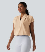 Blouse esprit bureau ample défroissage facile, col V et manches chauve-souris