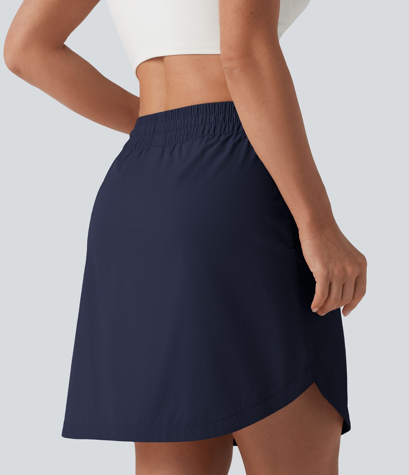 Jupe-short golf mini 2-en-1 taille haute à cordon de serrage et ourlet arrondi avec poches - Longueur plus longue