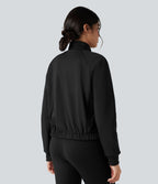 Veste polaire de randonnée réversible col montant manches longues avec poches (Deux looks en un)