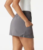 Jupe-short de golf mini taille mi-haute avec poches et porte-tees