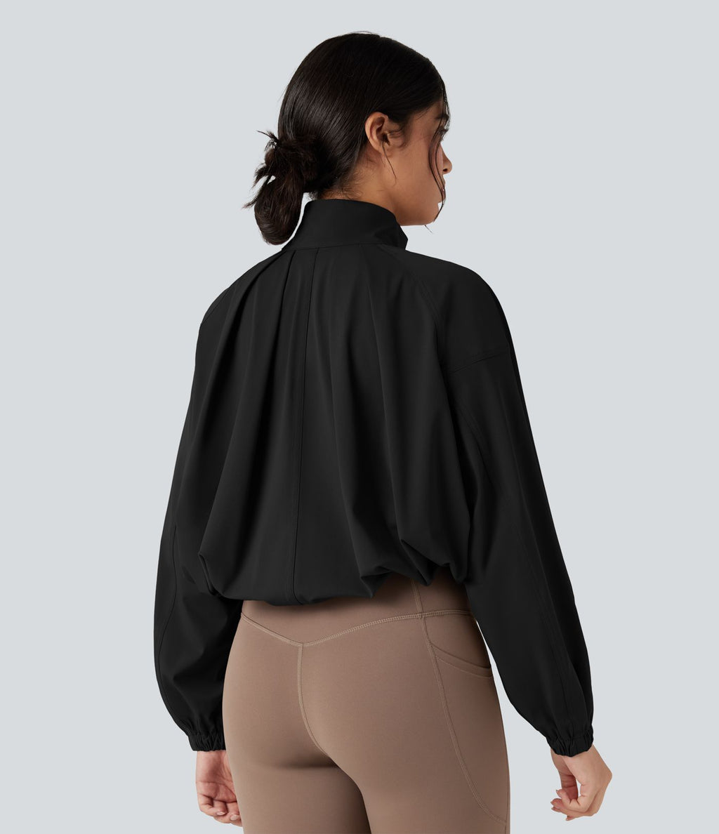 Veste de sport col montant à manches longues avec cordon de serrage et poches