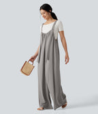 Combinaison fluide coupe baggy en tissu gaufré avec bretelles ajustables et poches