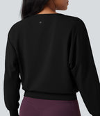 Top de sport yoga SoftlyZero™ Airy col rond manches longues ourlet croisé