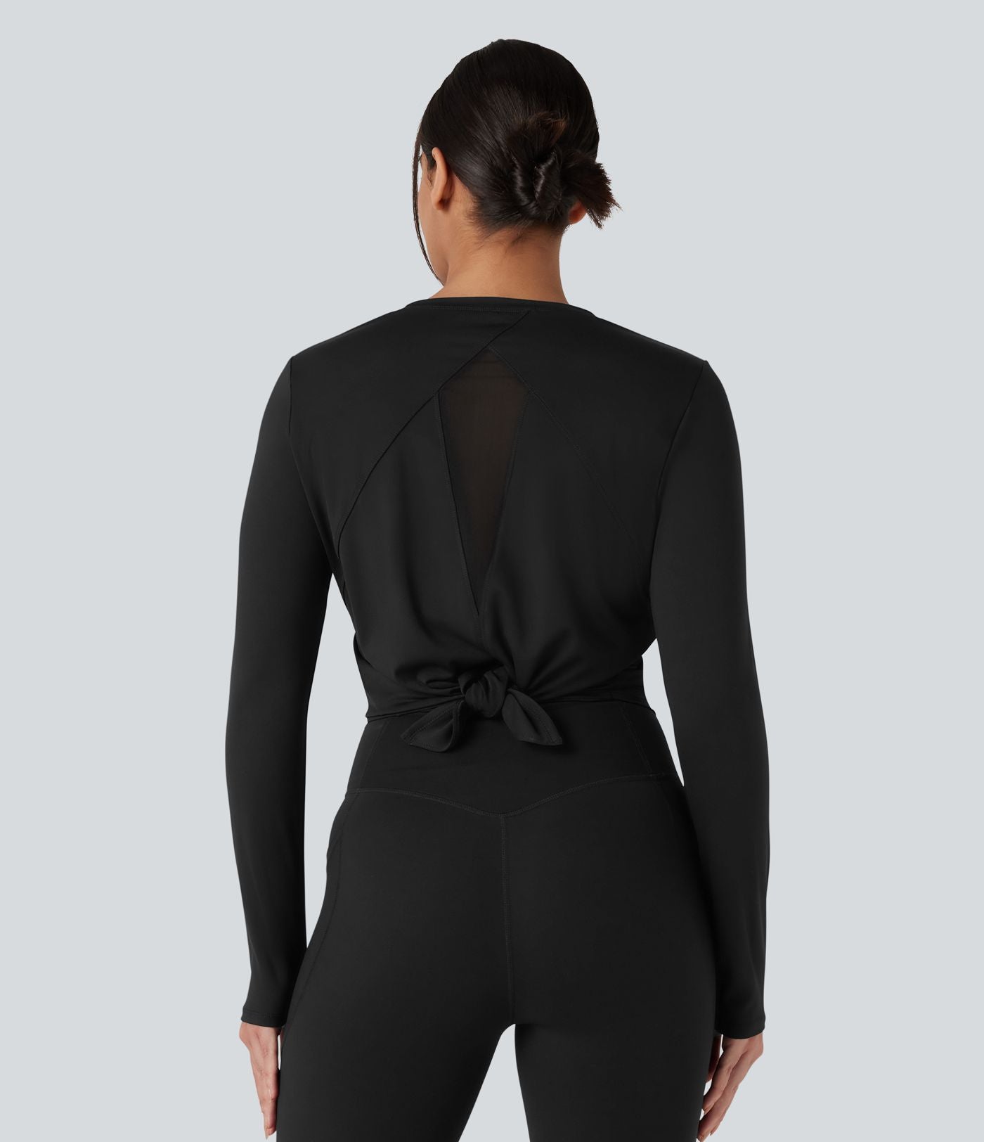 Top de sport running col rond mesh contrastant liens dans le dos manches longues