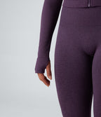 Veste de yoga courte ajustée Seamless Flow à col montant, manches longues et trous pour les pouces