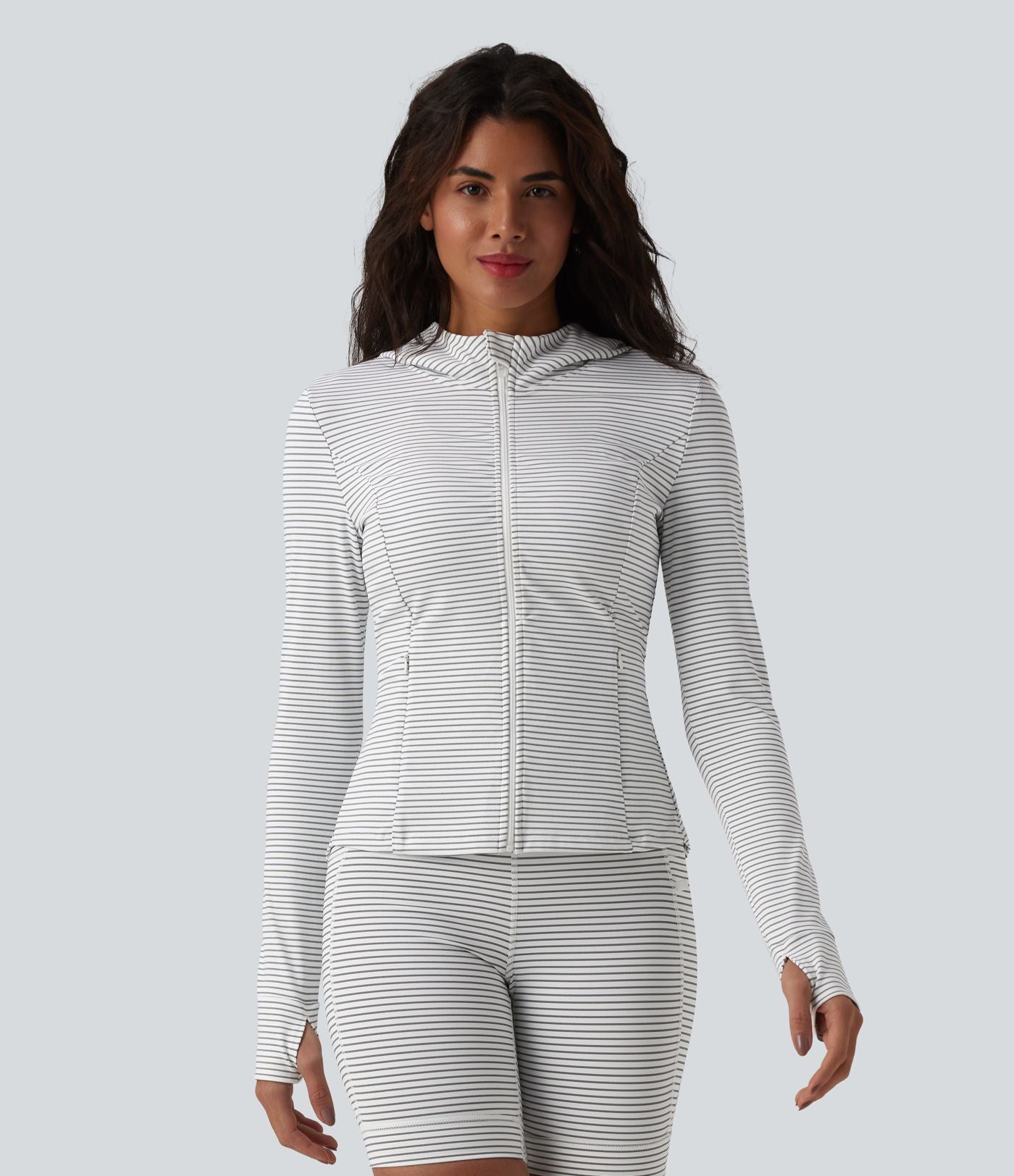 Veste de yoga à capuche manches longues avec trous pour pouces et rayures avec poches