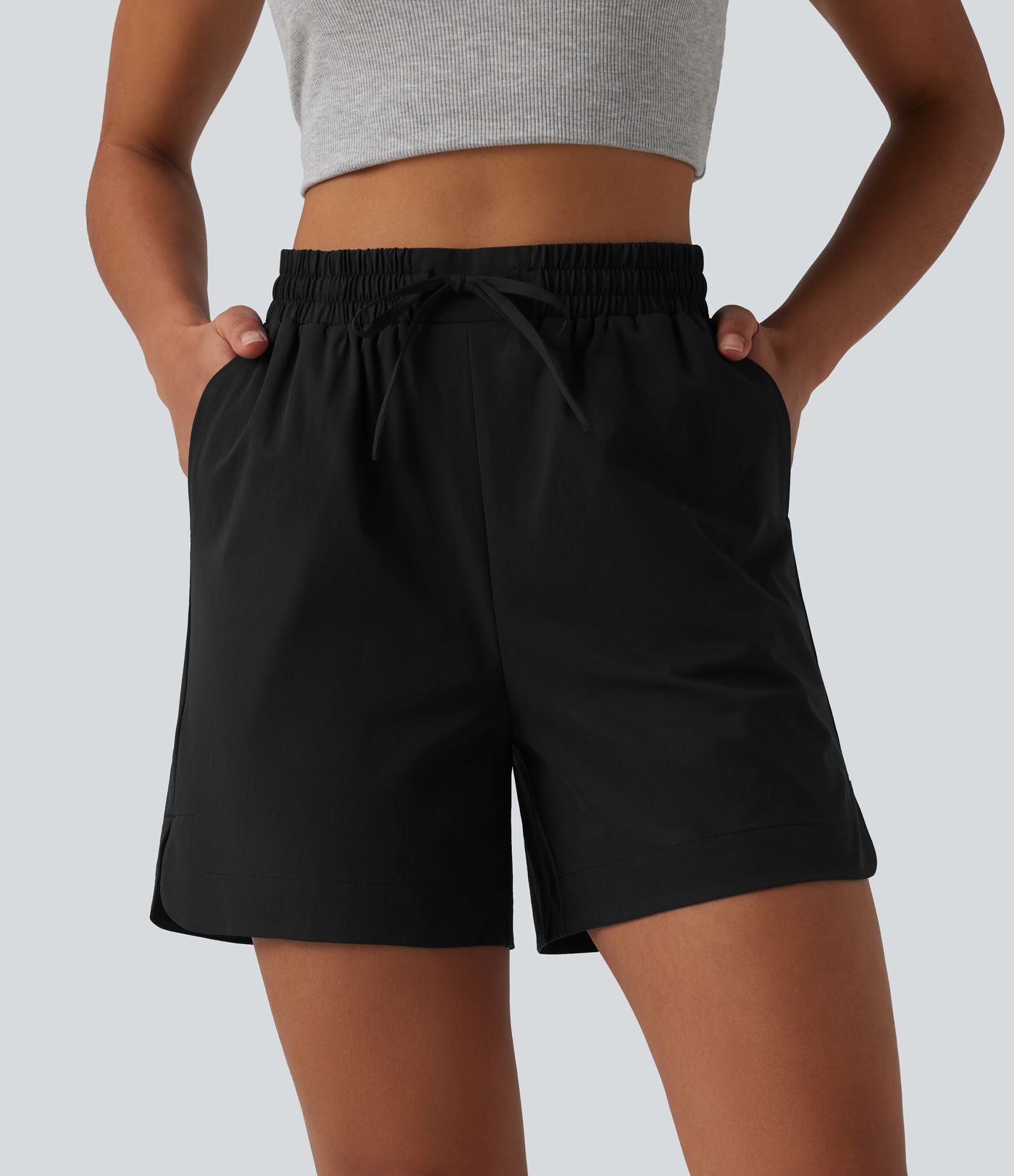Short ample décontracté taille haute avec cordon de serrage ourlet arrondi avec poches