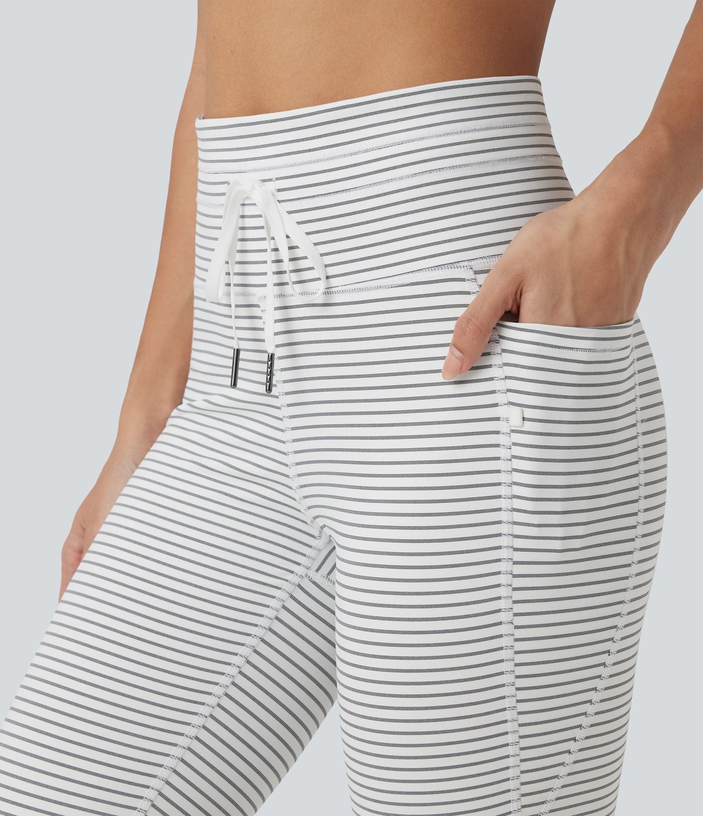 Legging corsaire de yoga taille haute à rayures avec cordon de serrage et poches