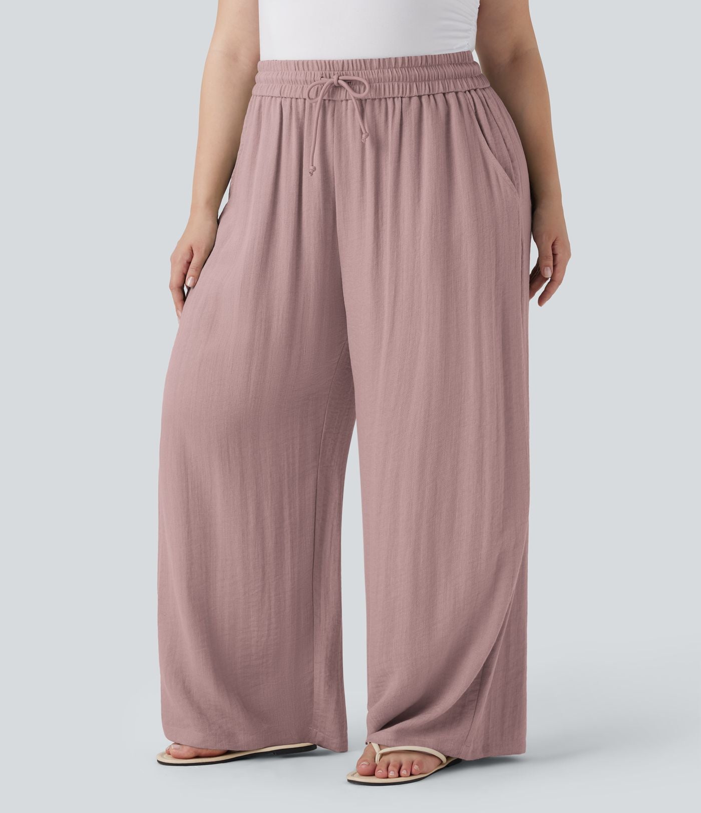 Pantalon décontracté grande taille large fluide taille haute effet lin avec cordon de serrage et poches