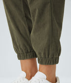 Pantalon décontracté en velours côtelé avec taille mi-haute, boutons et fermeture éclair
