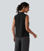 Blouse tailleur ample col revers sans manches à boutonnière