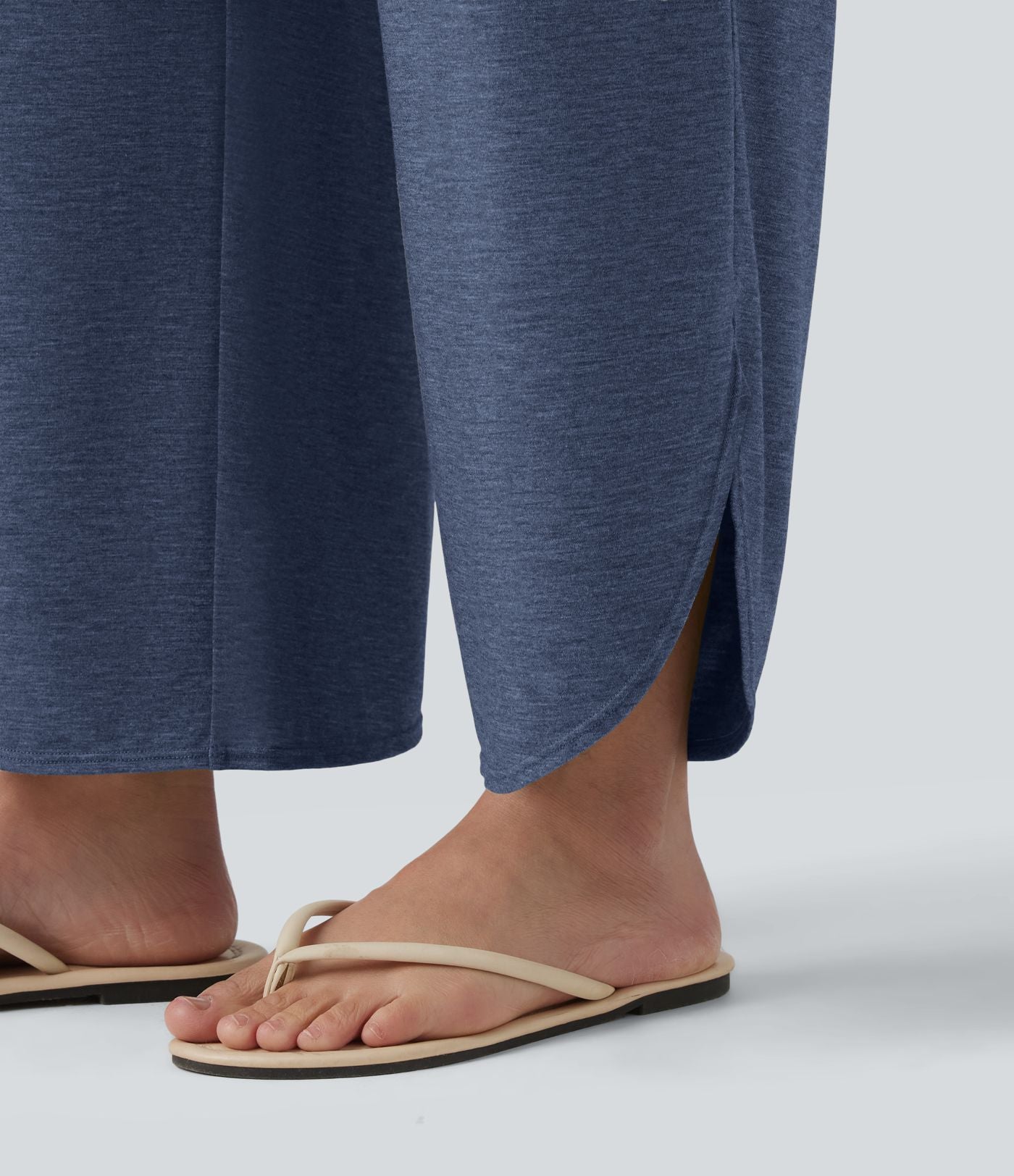 Pantalon décontracté taille haute gainant avec ourlet arrondi et poches