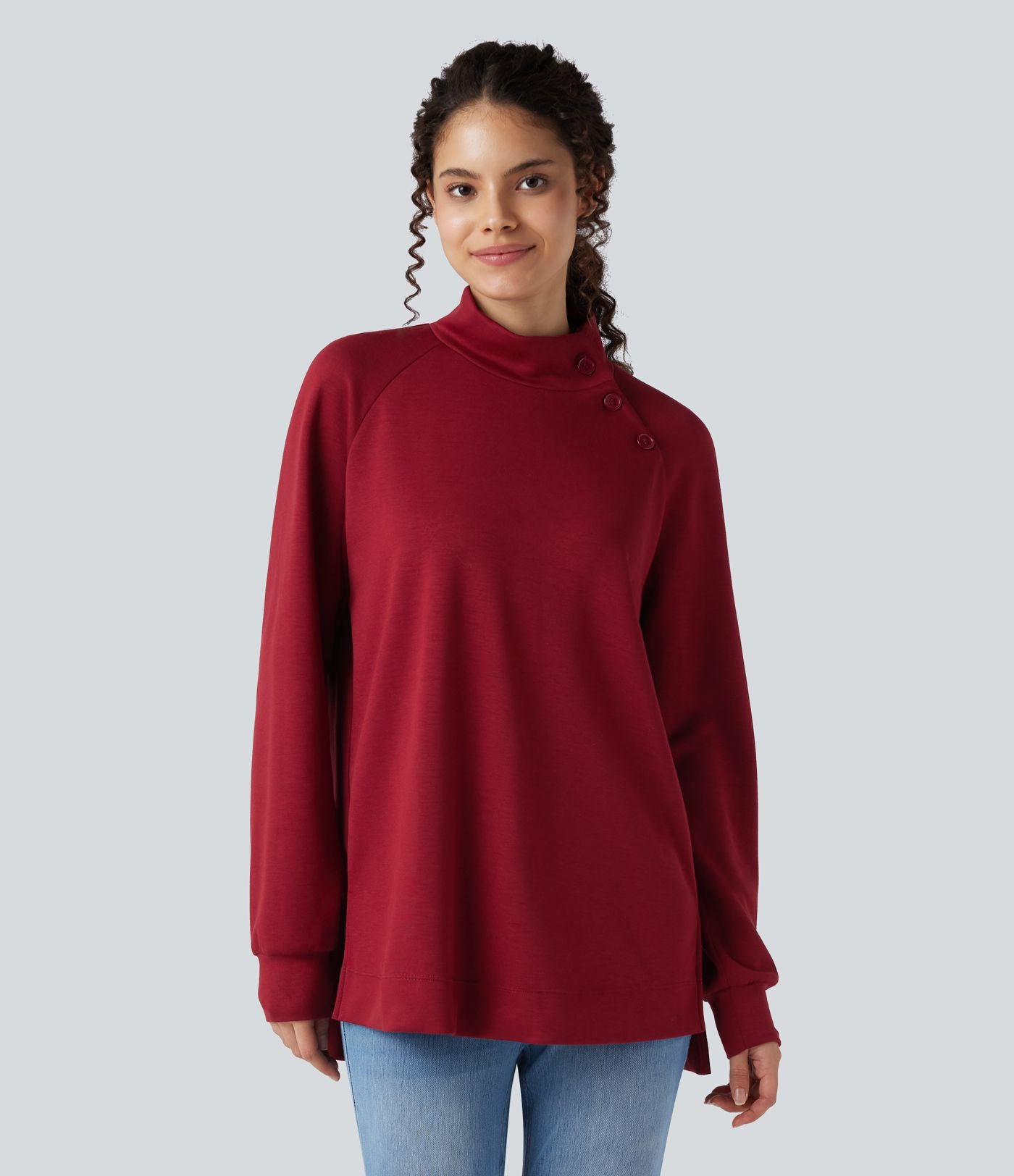 Sweat décontracté ample col montant à manches longues avec fentes et ourlet asymétrique