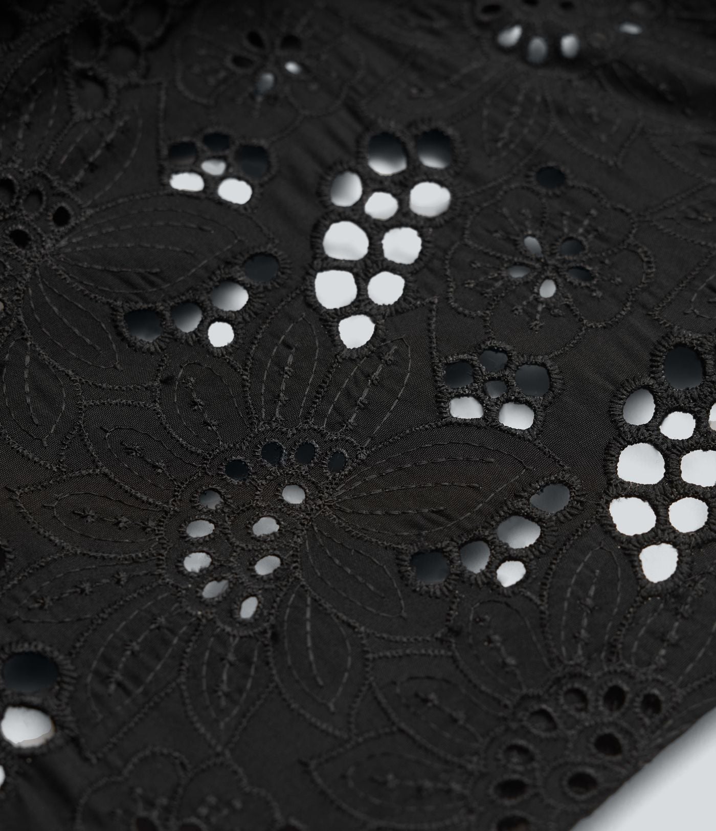 Jupe mini trapèze 2-en-1 taille haute avec fermeture éclair invisible et broderie anglaise