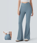 Pantalon large fluide côtelé à taille haute croisée avec poche arrière