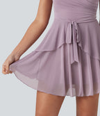 Robe nuisette mini demoiselle d'honneur et invitée de mariage avec brassière intégrée en mesh à col V noué et ourlet à volants