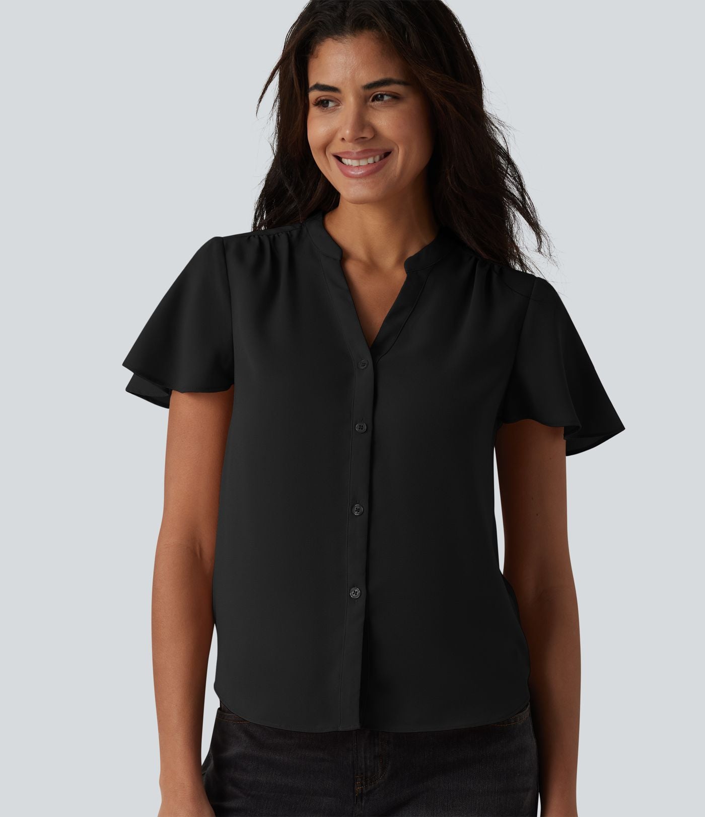 Blouse casual col V à manches volantées et ourlet arrondi