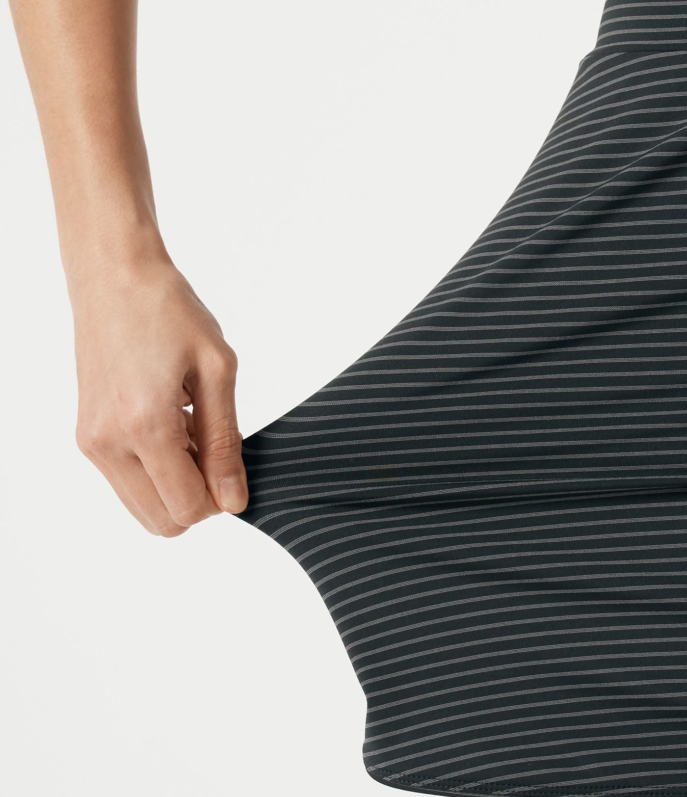 Jupe de golf mini moulante 2-en-1 taille haute à rayures à poches — longueur prolongée
