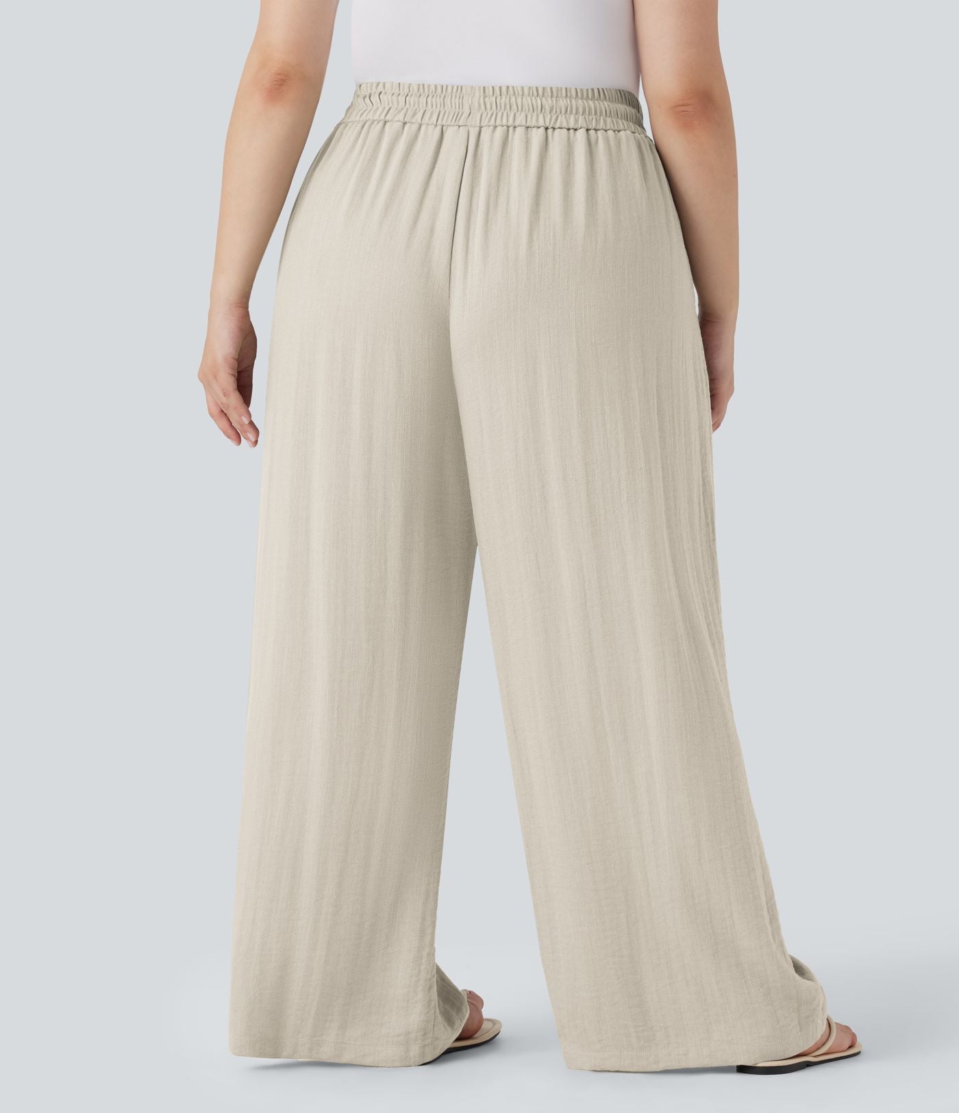 Pantalon décontracté grande taille large fluide taille haute effet lin avec cordon de serrage et poches