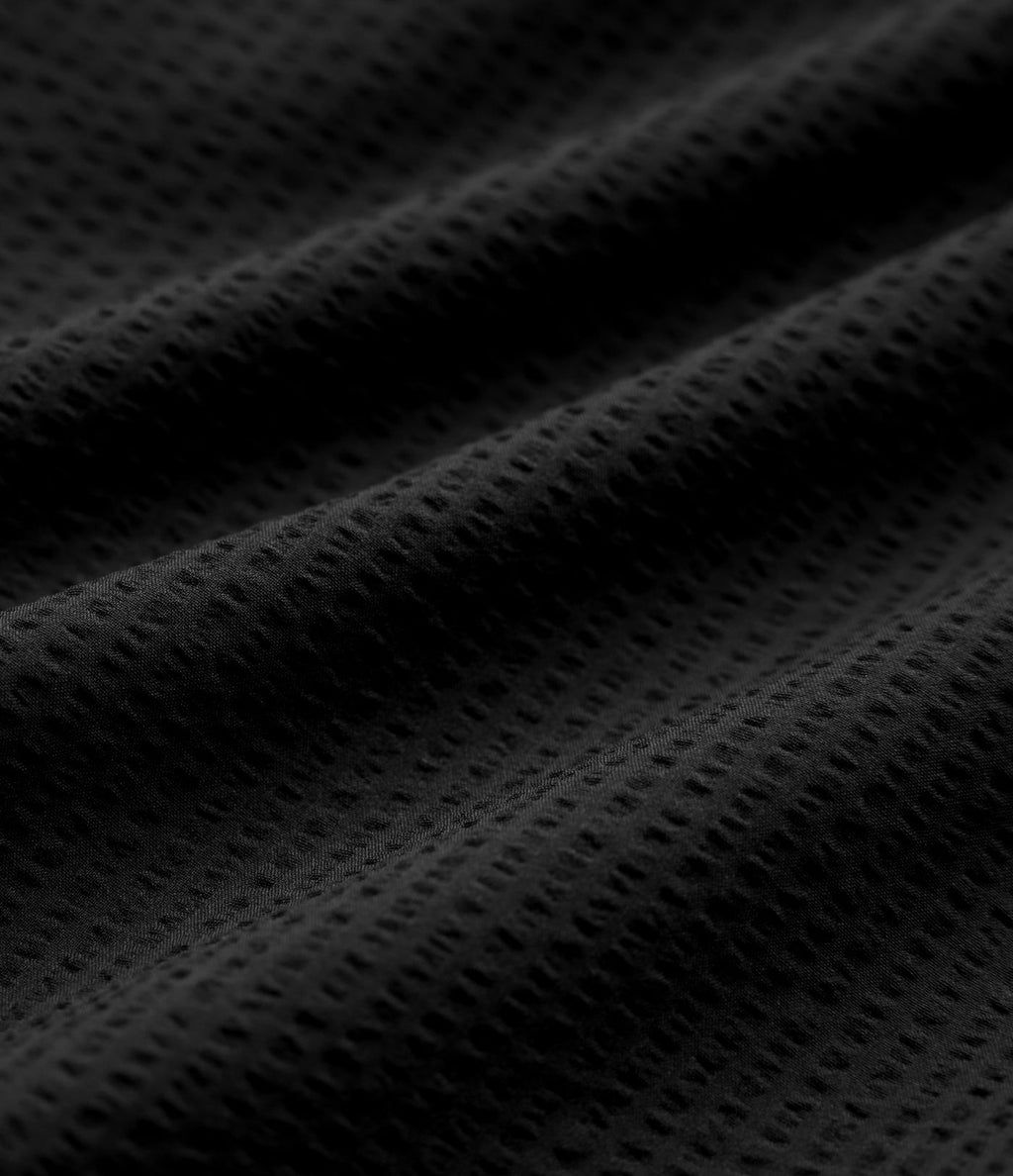 Short casual ample séchage rapide taille mi-haute aspect froissé avec poches à rabat