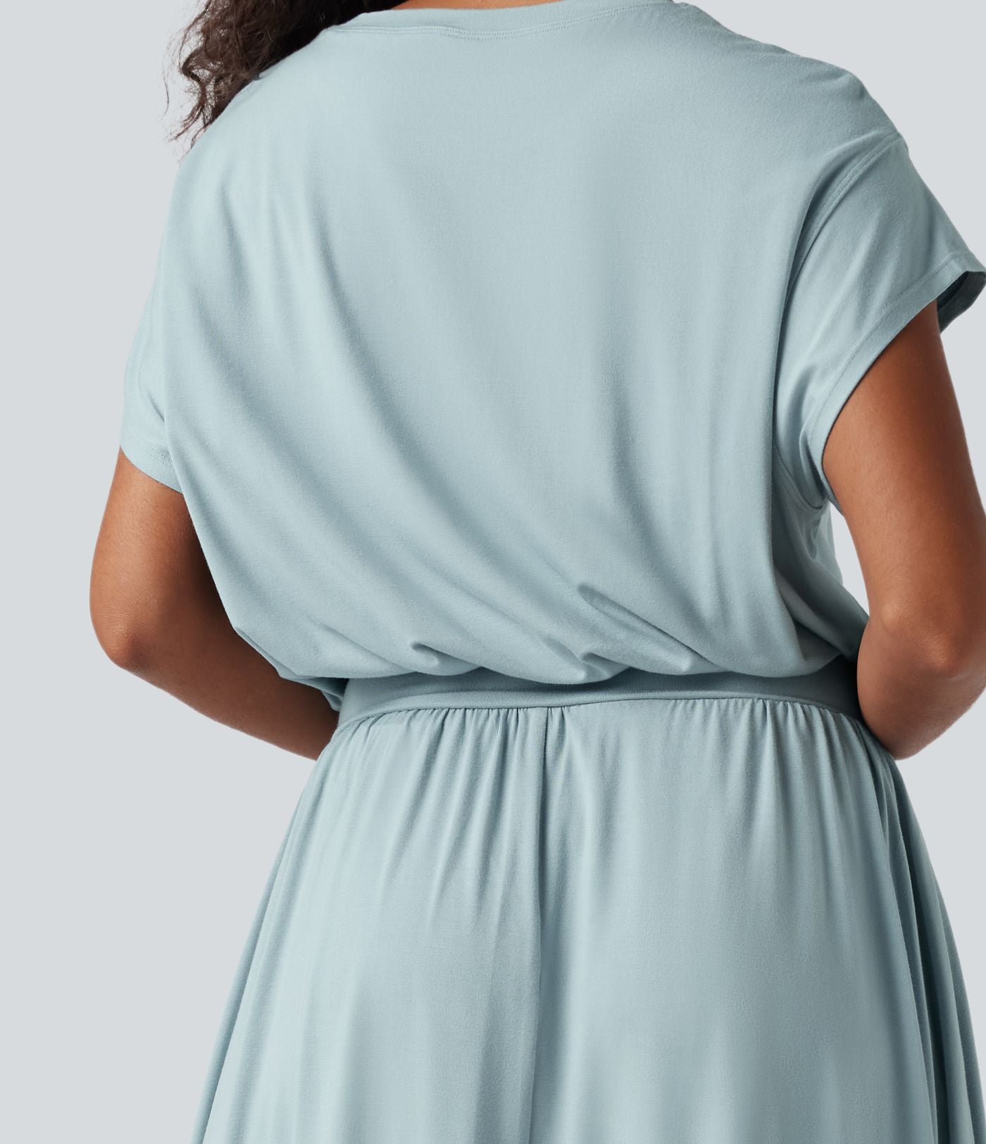 Robe de travail mi-longue fluide gainante à manches chauve-souris avec poches