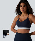 Brassière de sport SoftlyZero™ Plush à maintien léger, dos croisé ouvert, rayures color block et soutien intégré